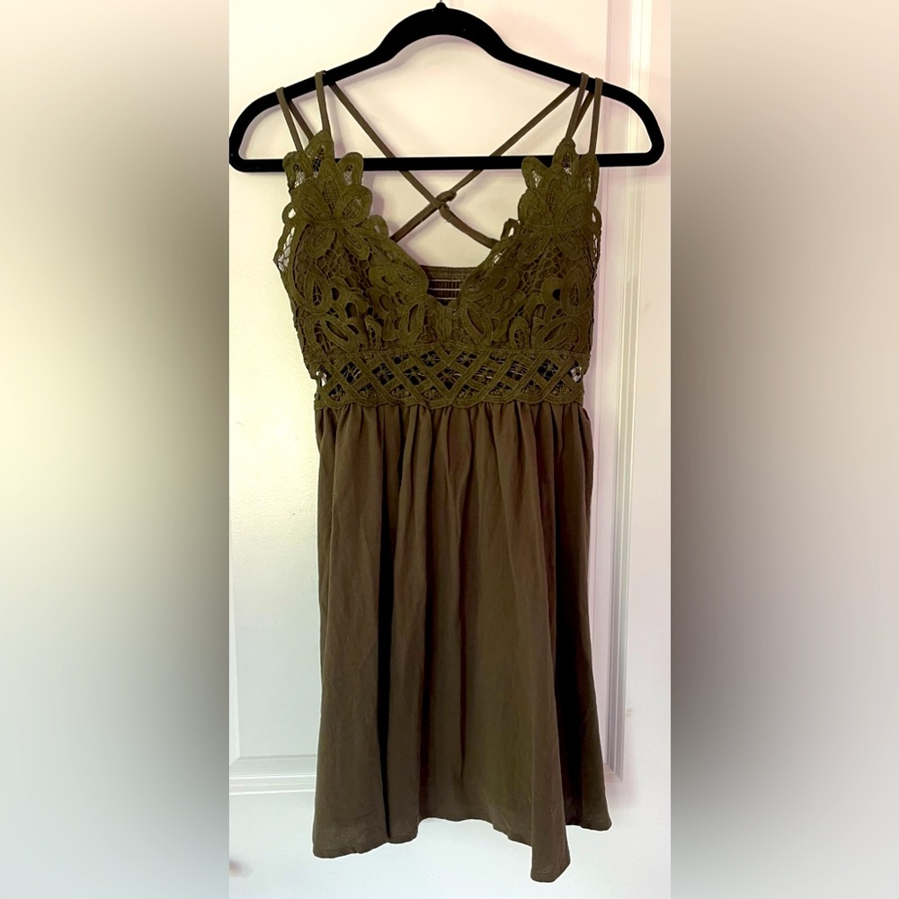Army green dress with a lace top.